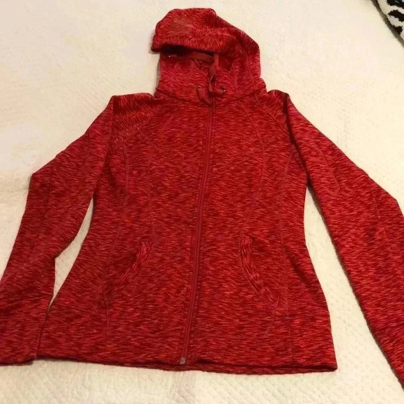 Athleta hoodie with two open pockets on front and zippered pocket on sleeve. - Picture 1 of 13